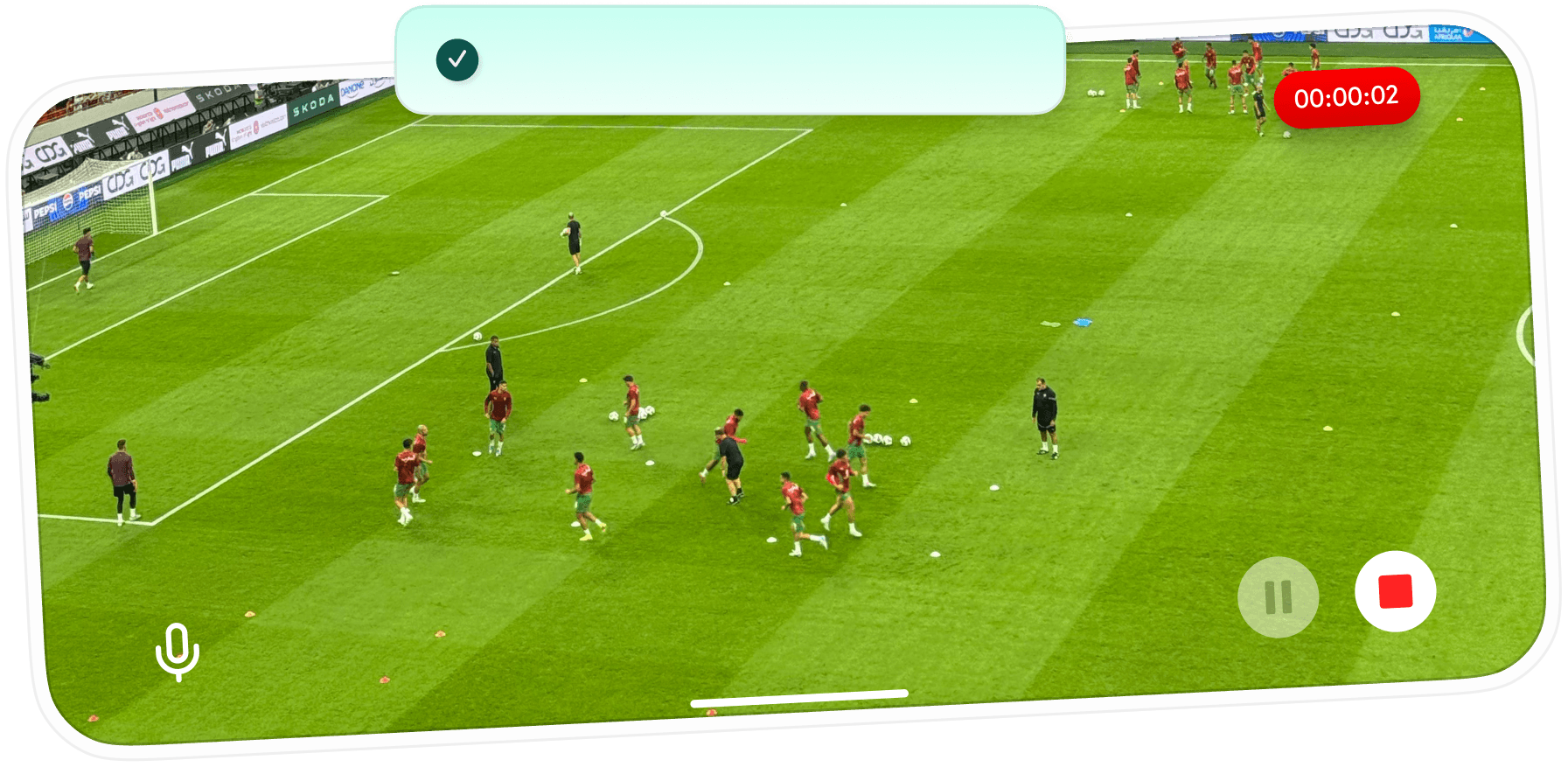 Smartphone showing live soccer match recording
